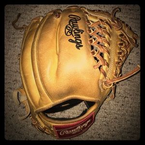 Orange Rawlings Heart of the Hide Baseball Glove